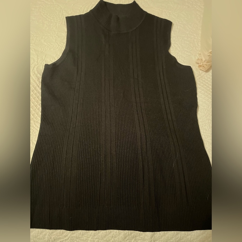 Women’s black knit top.